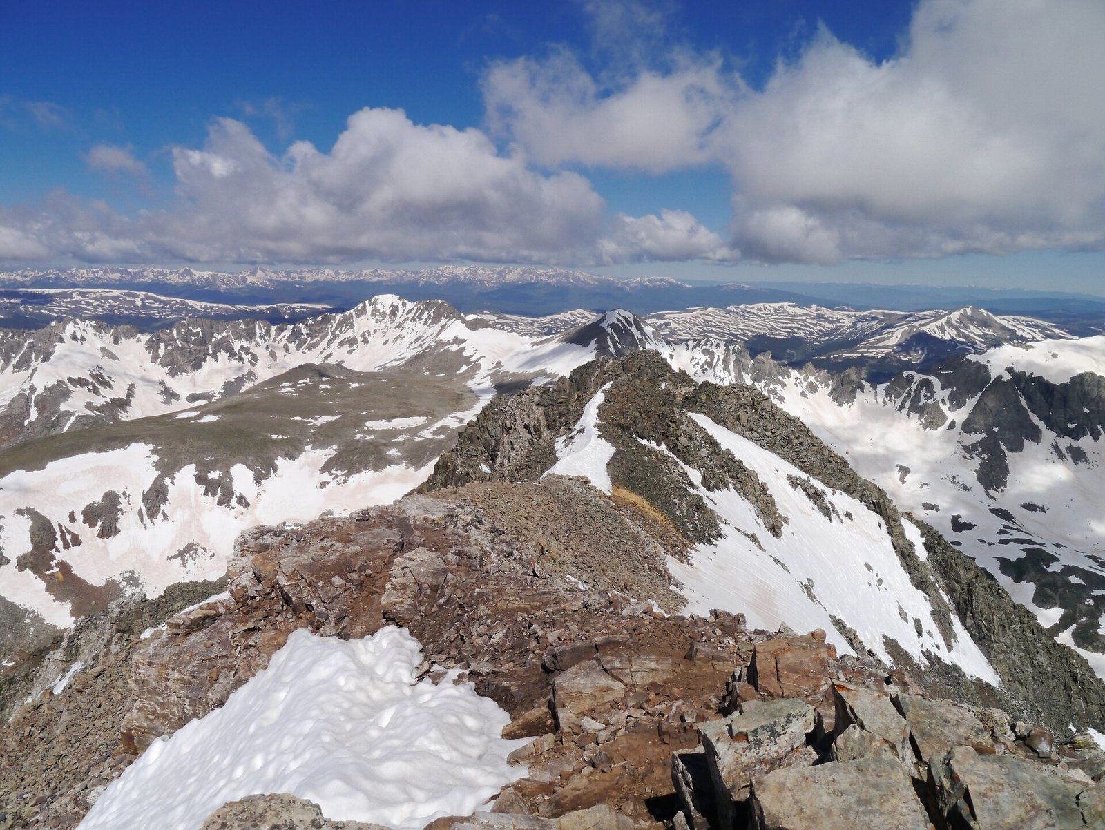 A snowy rock ridge on Quandary Peak in Colorado looking across high summits, a Wikimedia Commons photograph in the encyclopedia of Candace Cooley